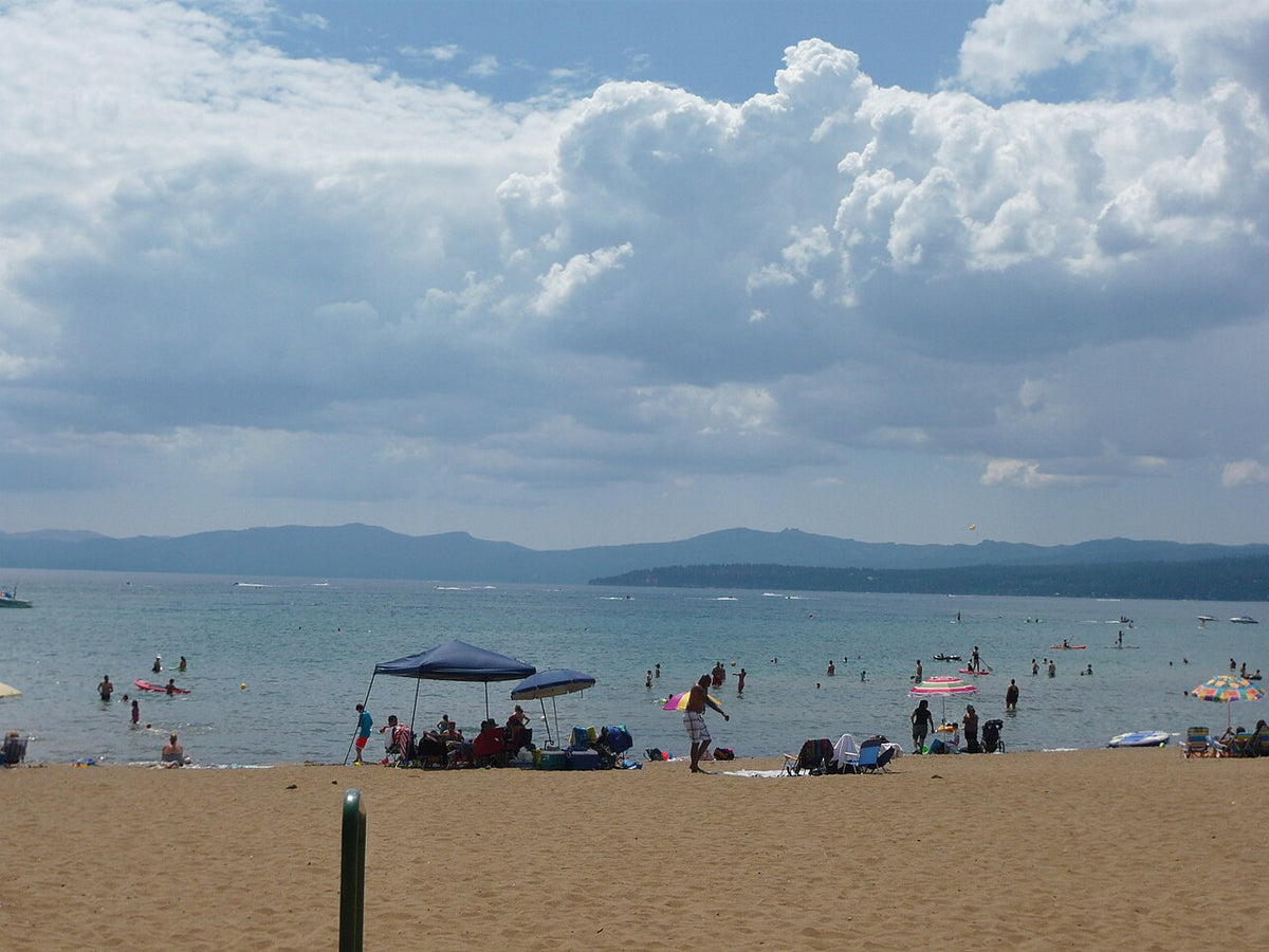 Clear blue water and a sand beach at Kings Beach State Recreation Area on Lake Tahoe, California