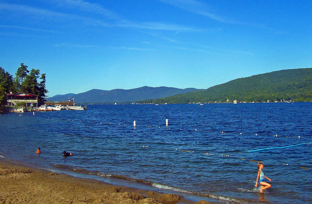 Lake George from the village beach, Adirondacks, New York, calm blue water and forested hills