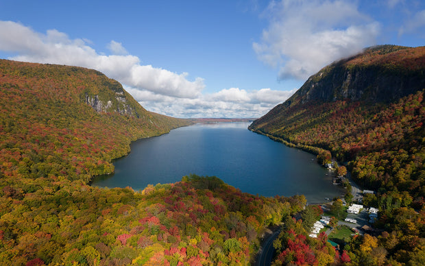 Lake Willoughby in Vermont's Northeast Kingdom, with dramatic cliffs of Mount Pisgah and Mount Hor rising from the water, ideal summer paddleboarding destination