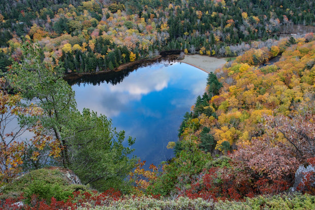 Echo Lake in Acadia National Park, Maine, blue water mirrored among autumn foliage, a scenic Maine paddling spot